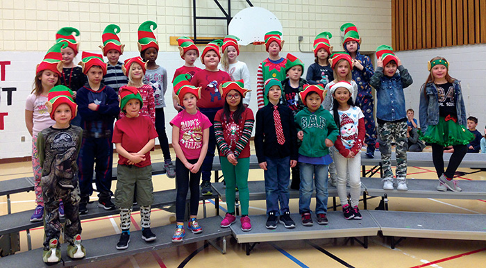 Mrs. Poole’s students over the years enjoyed prepping for Christmas concerts.”></a><br />
<p class=